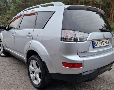 Серый Мицубиси Аутлендер, объемом двигателя 3 л и пробегом 197 тыс. км за 9500 $, фото 3 на Automoto.ua