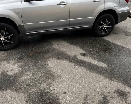 Сірий Міцубісі Аутлендер, об'ємом двигуна 2 л та пробігом 332 тис. км за 6200 $, фото 22 на Automoto.ua