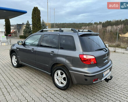 Серый Мицубиси Аутлендер, объемом двигателя 2 л и пробегом 196 тыс. км за 6450 $, фото 30 на Automoto.ua