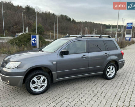 Серый Мицубиси Аутлендер, объемом двигателя 2 л и пробегом 196 тыс. км за 6450 $, фото 35 на Automoto.ua