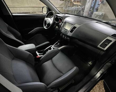 Серый Мицубиси Аутлендер, объемом двигателя 2.4 л и пробегом 190 тыс. км за 8000 $, фото 5 на Automoto.ua