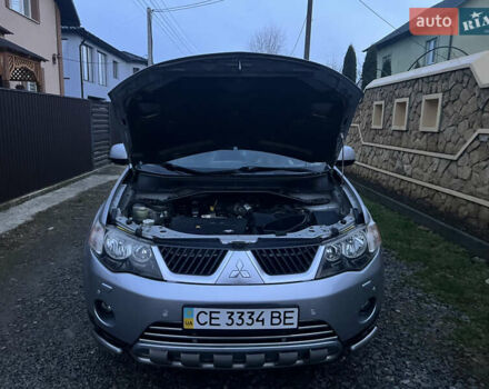 Серый Мицубиси Аутлендер, объемом двигателя 2.4 л и пробегом 236 тыс. км за 7600 $, фото 42 на Automoto.ua