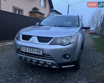 Серый Мицубиси Аутлендер, объемом двигателя 2.4 л и пробегом 236 тыс. км за 7600 $, фото 1 на Automoto.ua