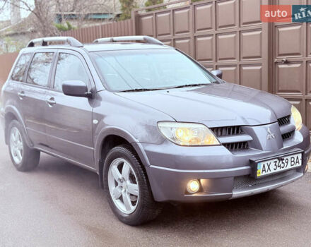 Серый Мицубиси Аутлендер, объемом двигателя 2.4 л и пробегом 240 тыс. км за 6900 $, фото 55 на Automoto.ua
