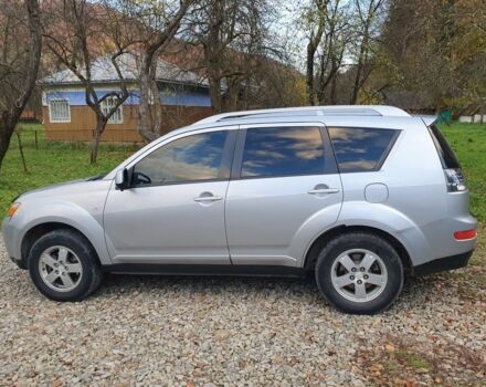 Серый Мицубиси Аутлендер, объемом двигателя 2 л и пробегом 320 тыс. км за 7500 $, фото 5 на Automoto.ua