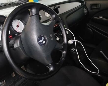 Сірий Міцубісі Аутлендер, об'ємом двигуна 2 л та пробігом 191 тис. км за 6500 $, фото 11 на Automoto.ua