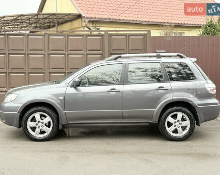 Серый Мицубиси Аутлендер, объемом двигателя 2.4 л и пробегом 240 тыс. км за 6900 $, фото 5 на Automoto.ua