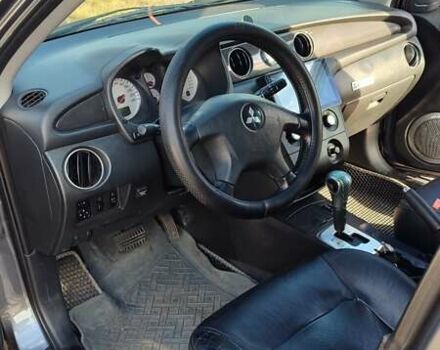 Серый Мицубиси Аутлендер, объемом двигателя 2.38 л и пробегом 189 тыс. км за 7600 $, фото 6 на Automoto.ua