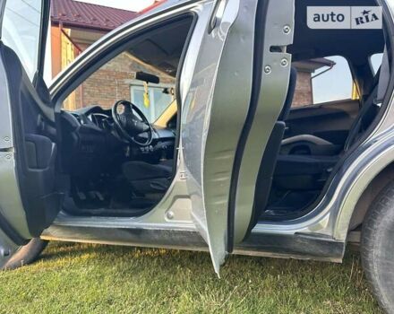 Сірий Міцубісі Аутлендер, об'ємом двигуна 2 л та пробігом 191 тис. км за 8900 $, фото 17 на Automoto.ua
