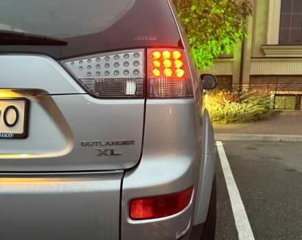 Серый Мицубиси Аутлендер, объемом двигателя 3 л и пробегом 129 тыс. км за 10500 $, фото 9 на Automoto.ua