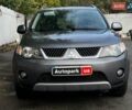Серый Мицубиси Аутлендер, объемом двигателя 2.4 л и пробегом 130 тыс. км за 7940 $, фото 2 на Automoto.ua