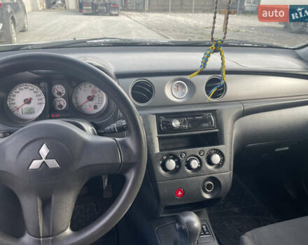Сірий Міцубісі Аутлендер, об'ємом двигуна 2.4 л та пробігом 166 тис. км за 6700 $, фото 13 на Automoto.ua