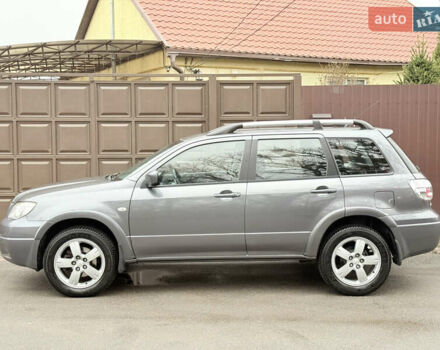 Серый Мицубиси Аутлендер, объемом двигателя 2.4 л и пробегом 240 тыс. км за 6900 $, фото 8 на Automoto.ua