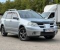 Сірий Міцубісі Аутлендер, об'ємом двигуна 2.4 л та пробігом 197 тис. км за 6950 $, фото 1 на Automoto.ua