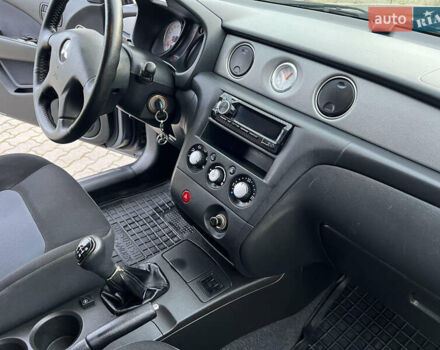 Серый Мицубиси Аутлендер, объемом двигателя 2 л и пробегом 196 тыс. км за 6450 $, фото 7 на Automoto.ua