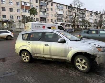 Серый Мицубиси Аутлендер, объемом двигателя 2 л и пробегом 254 тыс. км за 4000 $, фото 1 на Automoto.ua