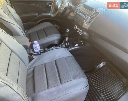 Серый Мицубиси Аутлендер, объемом двигателя 1.97 л и пробегом 257 тыс. км за 9000 $, фото 16 на Automoto.ua