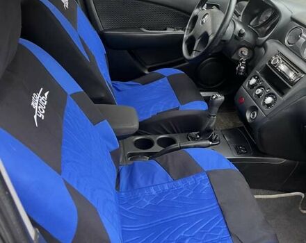 Серый Мицубиси Аутлендер, объемом двигателя 2 л и пробегом 380 тыс. км за 3700 $, фото 6 на Automoto.ua