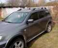 Серый Мицубиси Аутлендер, объемом двигателя 2.4 л и пробегом 226 тыс. км за 6900 $, фото 7 на Automoto.ua