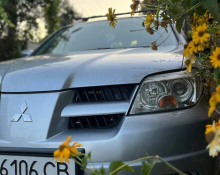 Серый Мицубиси Аутлендер, объемом двигателя 2.38 л и пробегом 238 тыс. км за 7450 $, фото 53 на Automoto.ua