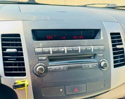 Серый Мицубиси Аутлендер, объемом двигателя 3 л и пробегом 188 тыс. км за 10000 $, фото 26 на Automoto.ua