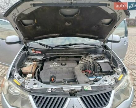 Серый Мицубиси Аутлендер, объемом двигателя 2 л и пробегом 332 тыс. км за 7650 $, фото 29 на Automoto.ua