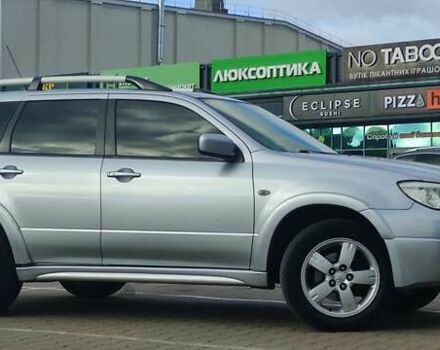 Сірий Міцубісі Аутлендер, об'ємом двигуна 2.4 л та пробігом 170 тис. км за 6400 $, фото 1 на Automoto.ua