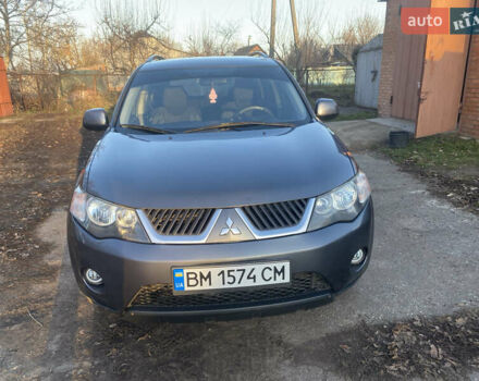 Серый Мицубиси Аутлендер, объемом двигателя 1.97 л и пробегом 257 тыс. км за 9000 $, фото 4 на Automoto.ua