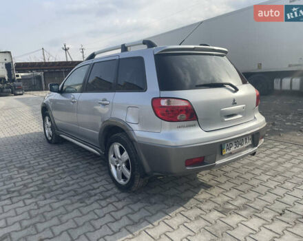 Сірий Міцубісі Аутлендер, об'ємом двигуна 2.4 л та пробігом 166 тис. км за 6700 $, фото 3 на Automoto.ua