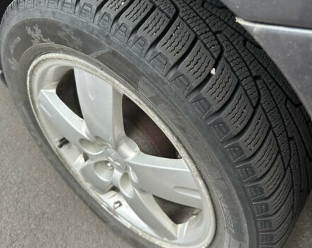 Серый Мицубиси Аутлендер, объемом двигателя 2 л и пробегом 200 тыс. км за 5900 $, фото 5 на Automoto.ua