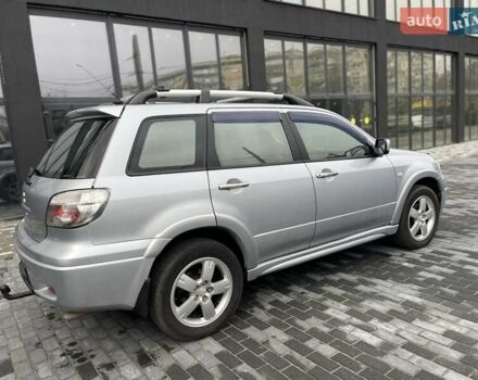Серый Мицубиси Аутлендер, объемом двигателя 2.38 л и пробегом 280 тыс. км за 5800 $, фото 7 на Automoto.ua