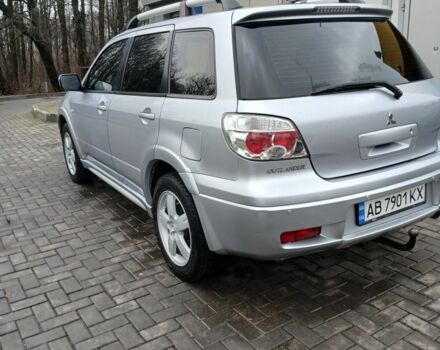 Серый Мицубиси Аутлендер, объемом двигателя 2.4 л и пробегом 300 тыс. км за 5900 $, фото 2 на Automoto.ua