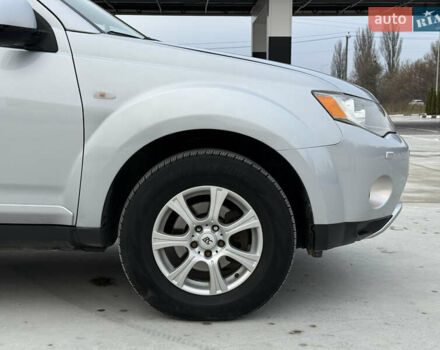 Серый Мицубиси Аутлендер, объемом двигателя 2 л и пробегом 299 тыс. км за 7750 $, фото 4 на Automoto.ua