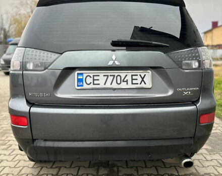 Сірий Міцубісі Аутлендер, об'ємом двигуна 2.36 л та пробігом 380 тис. км за 10000 $, фото 11 на Automoto.ua