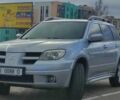 Сірий Міцубісі Аутлендер, об'ємом двигуна 2.4 л та пробігом 170 тис. км за 6400 $, фото 7 на Automoto.ua