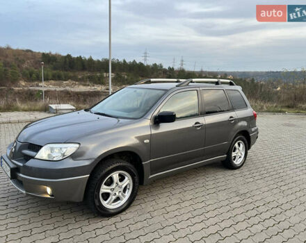 Серый Мицубиси Аутлендер, объемом двигателя 2 л и пробегом 196 тыс. км за 6450 $, фото 26 на Automoto.ua