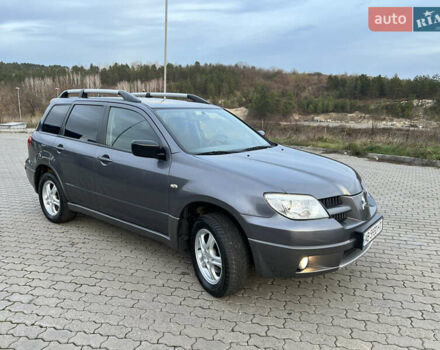 Сірий Міцубісі Аутлендер, об'ємом двигуна 2 л та пробігом 192 тис. км за 6400 $, фото 25 на Automoto.ua