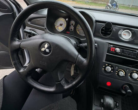 Серый Мицубиси Аутлендер, объемом двигателя 2.38 л и пробегом 238 тыс. км за 7450 $, фото 20 на Automoto.ua