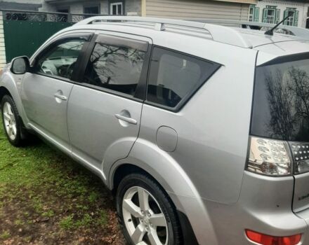 Серый Мицубиси Аутлендер, объемом двигателя 3 л и пробегом 183 тыс. км за 9200 $, фото 1 на Automoto.ua