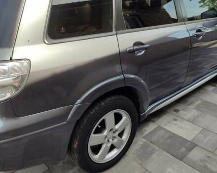 Серый Мицубиси Аутлендер, объемом двигателя 2.4 л и пробегом 23 тыс. км за 8300 $, фото 19 на Automoto.ua