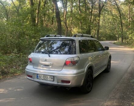 Сірий Міцубісі Аутлендер, об'ємом двигуна 2.4 л та пробігом 307 тис. км за 6700 $, фото 4 на Automoto.ua