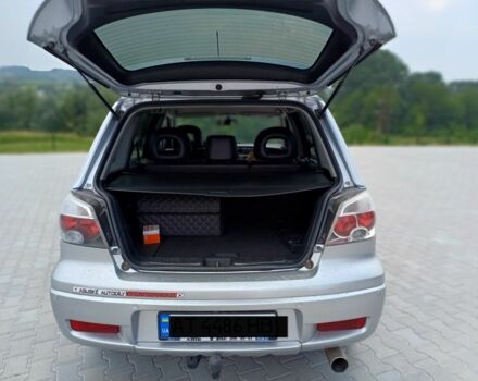 Серый Мицубиси Аутлендер, объемом двигателя 2.4 л и пробегом 243 тыс. км за 6200 $, фото 7 на Automoto.ua