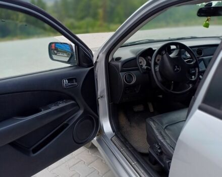 Серый Мицубиси Аутлендер, объемом двигателя 2.4 л и пробегом 243 тыс. км за 6200 $, фото 8 на Automoto.ua