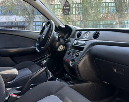 Серый Мицубиси Аутлендер, объемом двигателя 2 л и пробегом 270 тыс. км за 7999 $, фото 6 на Automoto.ua