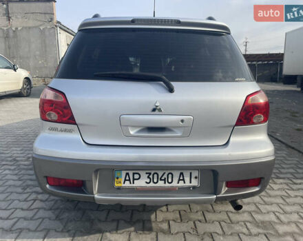 Сірий Міцубісі Аутлендер, об'ємом двигуна 2.4 л та пробігом 166 тис. км за 6700 $, фото 4 на Automoto.ua