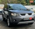 Серый Мицубиси Аутлендер, объемом двигателя 2.4 л и пробегом 130 тыс. км за 7940 $, фото 3 на Automoto.ua