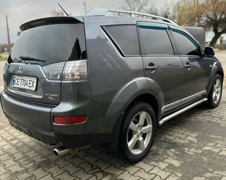 Сірий Міцубісі Аутлендер, об'ємом двигуна 2.36 л та пробігом 380 тис. км за 10000 $, фото 15 на Automoto.ua