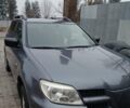 Сірий Міцубісі Аутлендер, об'ємом двигуна 2 л та пробігом 191 тис. км за 6500 $, фото 3 на Automoto.ua