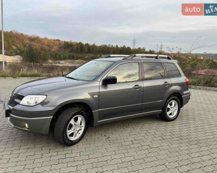 Серый Мицубиси Аутлендер, объемом двигателя 2 л и пробегом 196 тыс. км за 6450 $, фото 40 на Automoto.ua