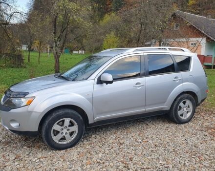 Серый Мицубиси Аутлендер, объемом двигателя 2 л и пробегом 320 тыс. км за 7500 $, фото 3 на Automoto.ua